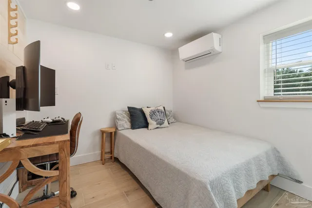 a view of balcony with wooden floor