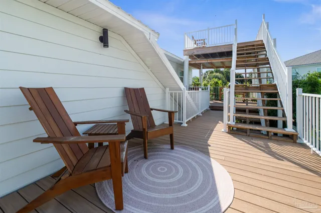 a view of a garden with a building in the background