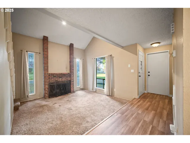a view of a livingroom with a fireplace