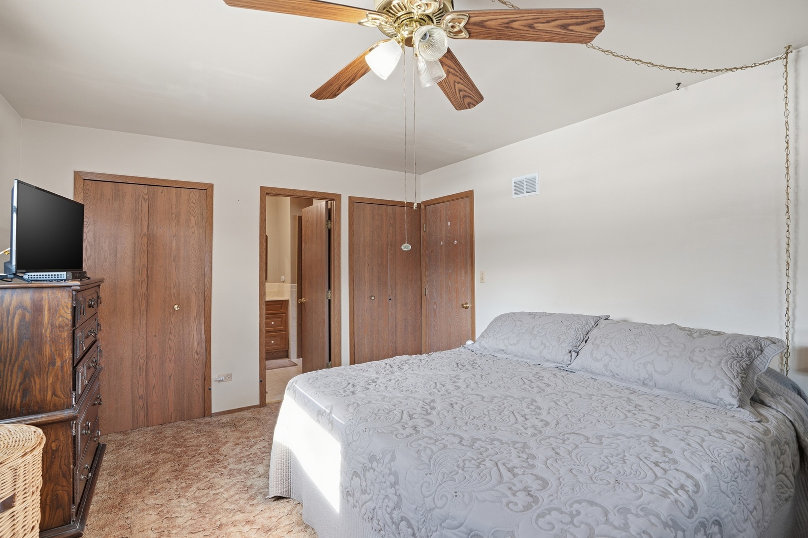 3435 218th Place Matteson, IL 60443 - Photo 15 of 19 a bedroom with a bed and a flat screen tv