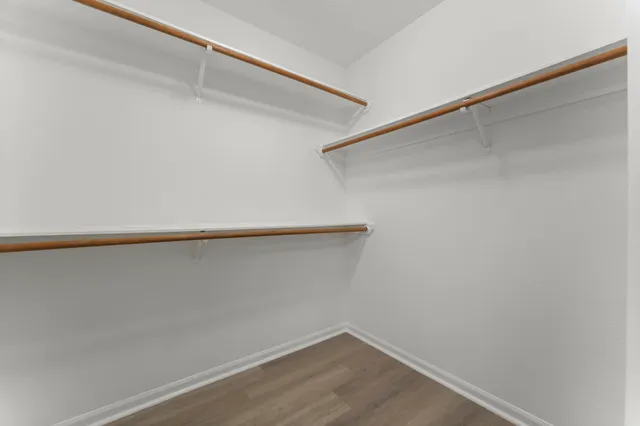 a view of a chairs and table in patio of the house
