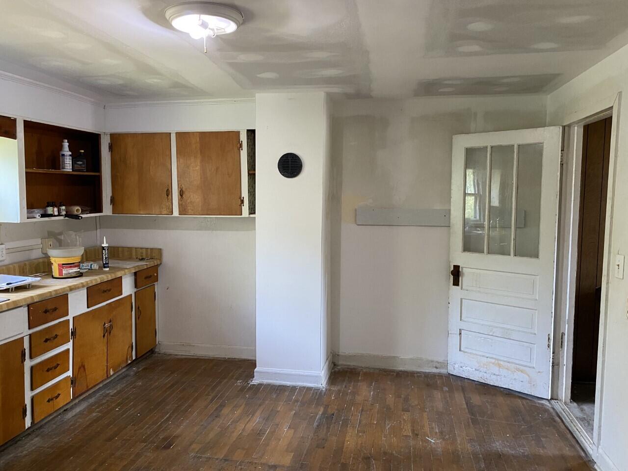 1050 Highland Road Thaxton, VA 24174 - Photo 15 of 31 a view of a kitchen with wooden floor and electronic appliances