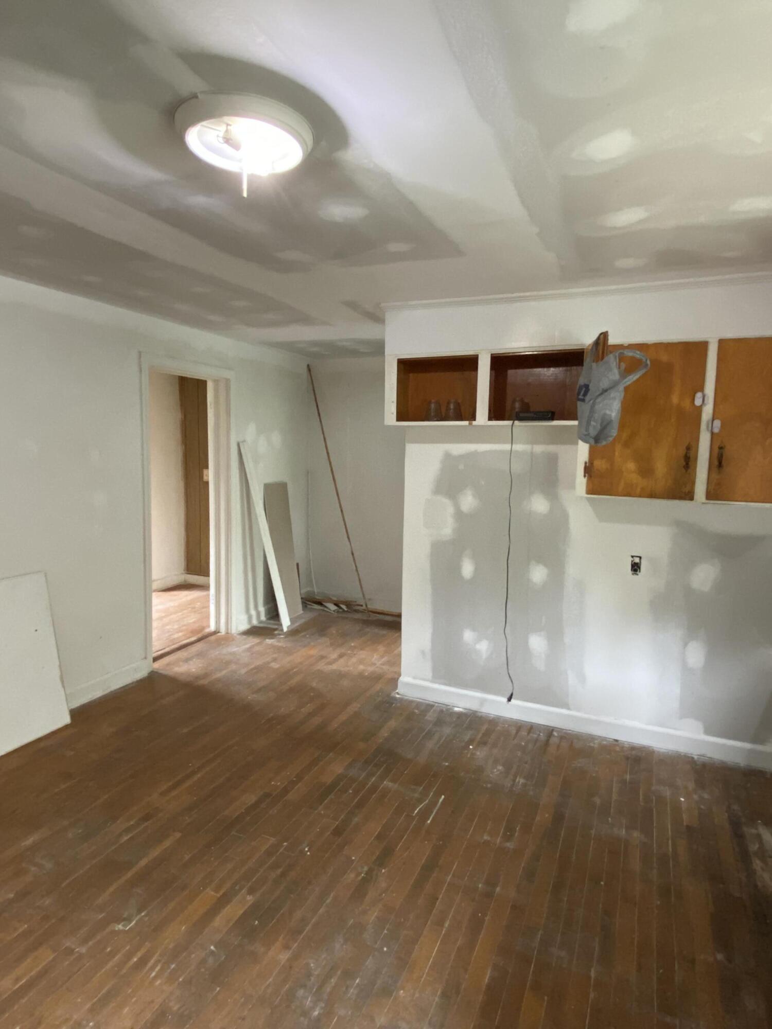 1050 Highland Road Thaxton, VA 24174 - Photo 18 of 31 a view of a livingroom with wooden floor