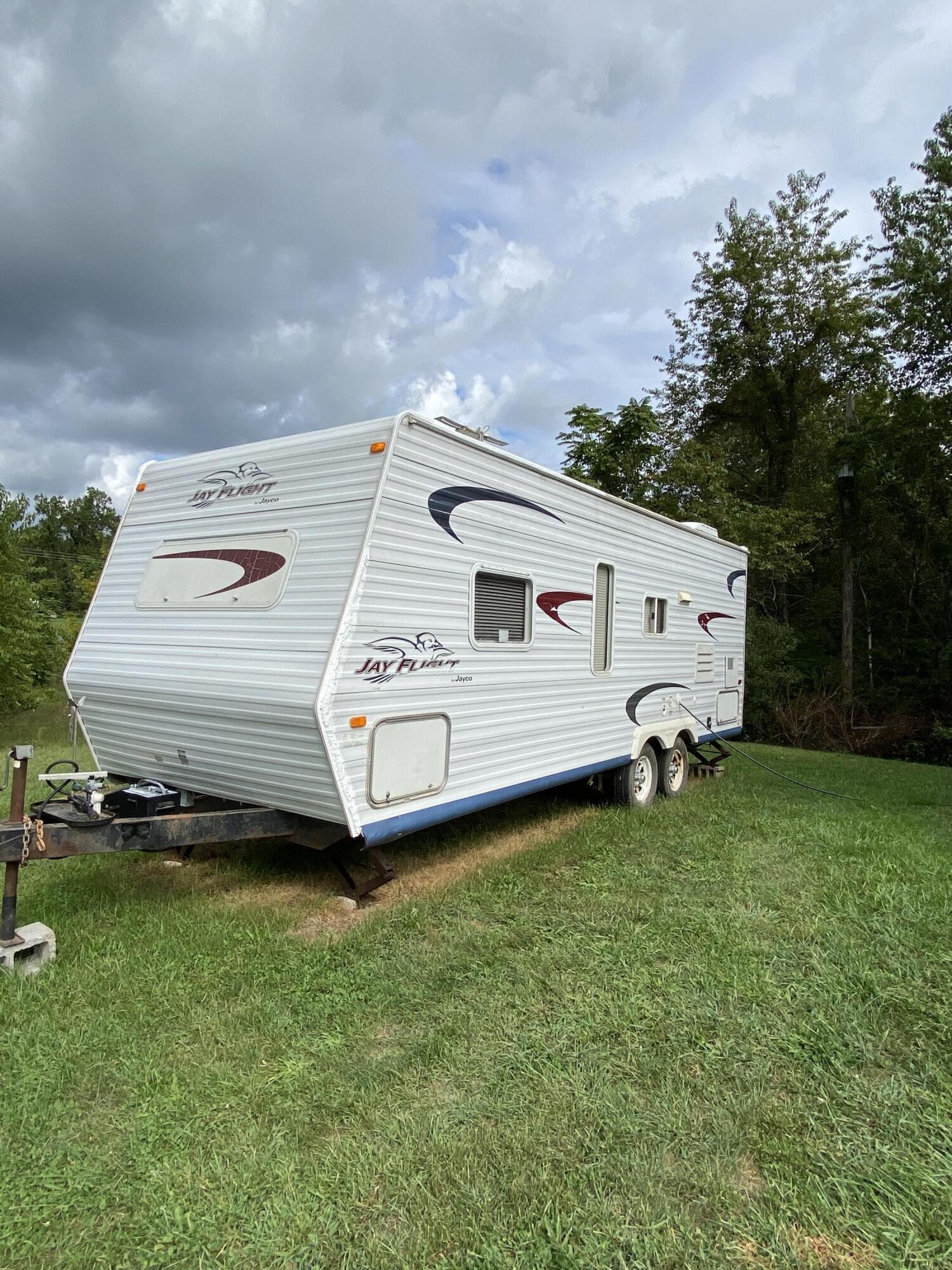 1050 Highland Road Thaxton, VA 24174 - Photo 22 of 31 a view of a house with a backyard