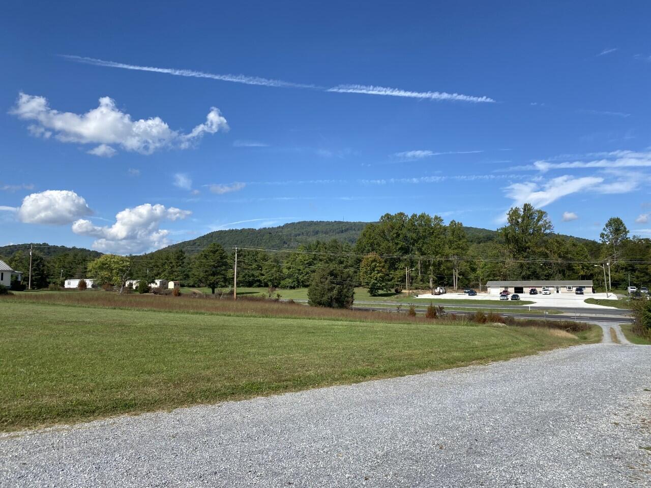 1050 Highland Road Thaxton, VA 24174 - Photo 6 of 31 a view of a golf course with a lake