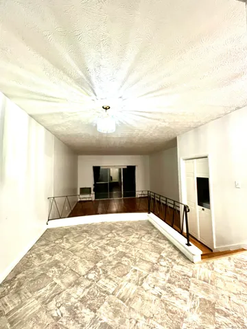 a view of a livingroom with a fireplace