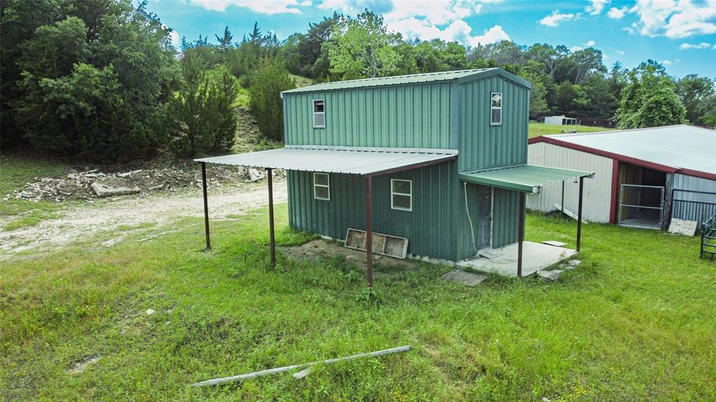 1846 Farm To Market 51 Decatur, TX 76234 - Photo 3 of 12 a view of a house with a backyard