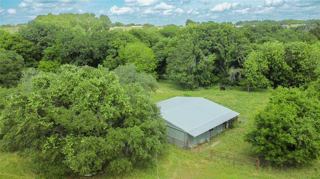 1846 Farm To Market 51 Decatur, TX 76234 - Photo 7 of 12 a view of a backyard with a barn