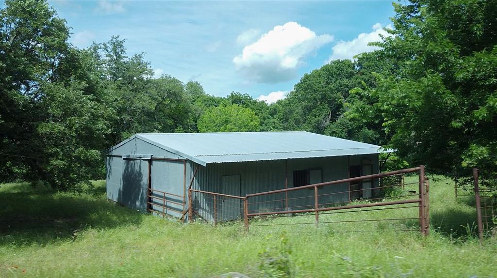 1846 Farm To Market 51 Decatur, TX 76234 - Photo 9 of 12 a view of an house with backyard space and balcony