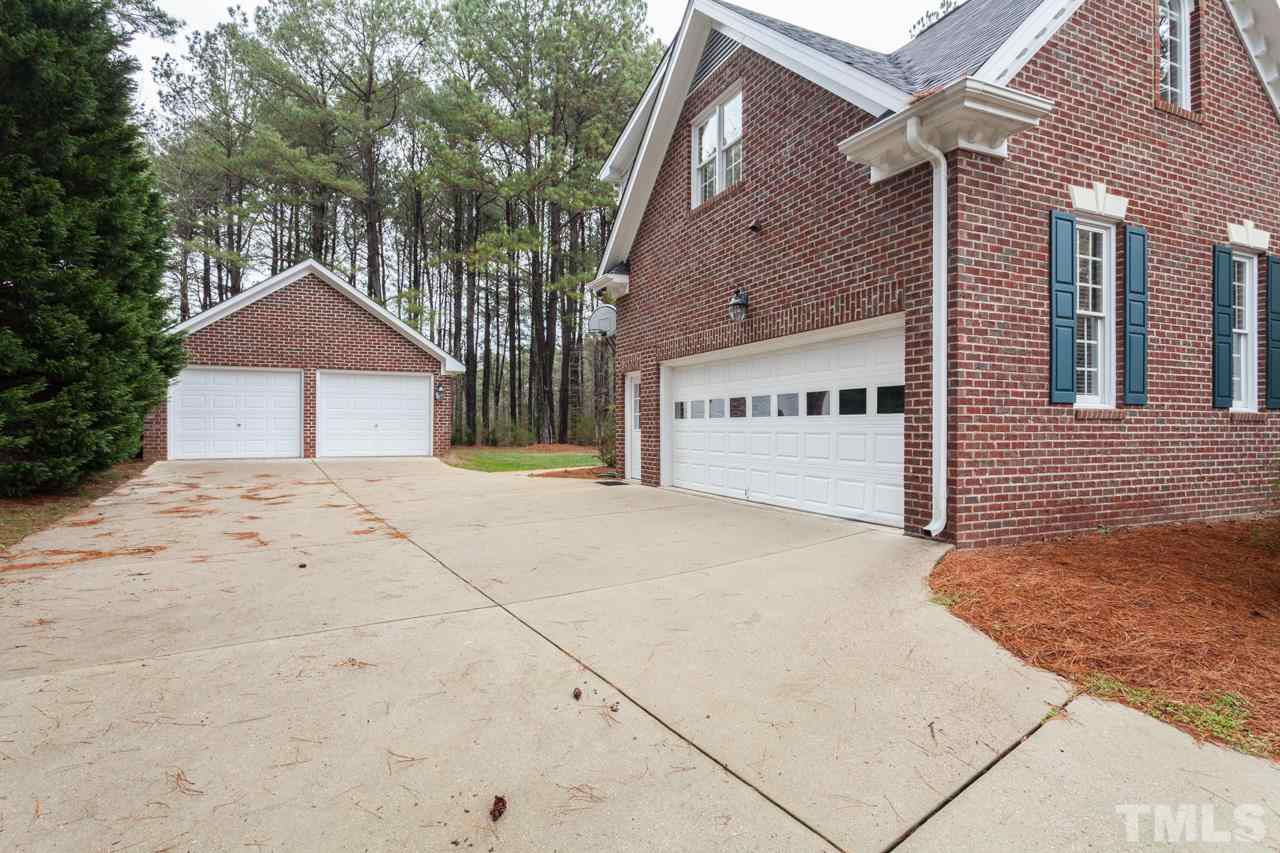 3709 White Chapel Way Raleigh, NC 27615 - Photo 21 of 25 This view illustrates how wonderful the parking options are with this home. The detached garage is perfect for your Falls Lake Boat or your dream workshop!