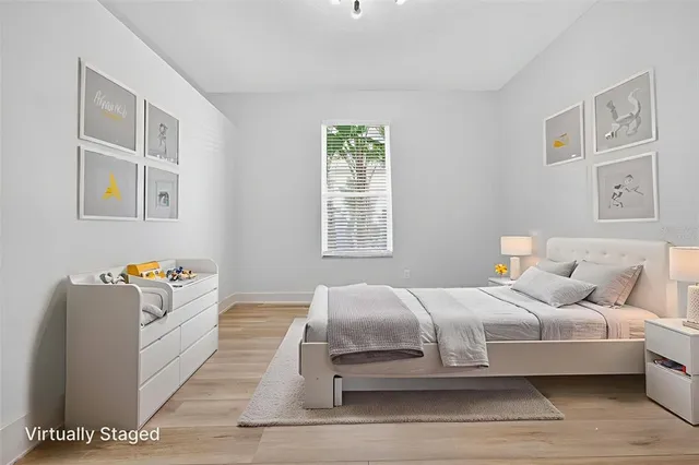 a work room with furniture and book shelf