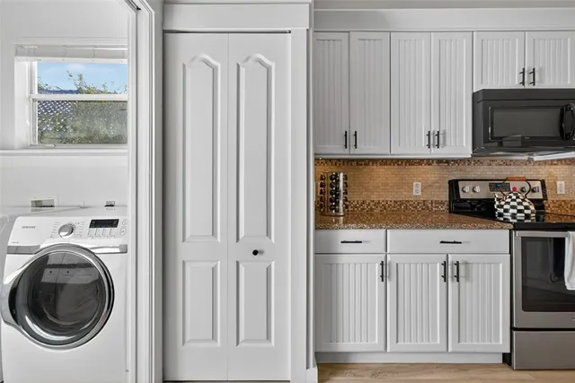 a view of washer and dryer in a utility room