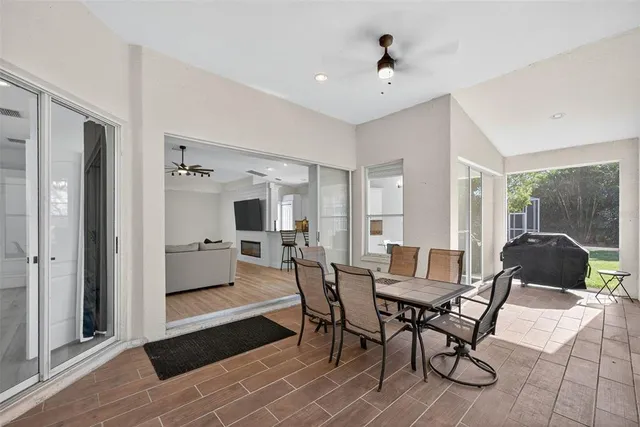 a view of kitchen with furniture and wooden floor