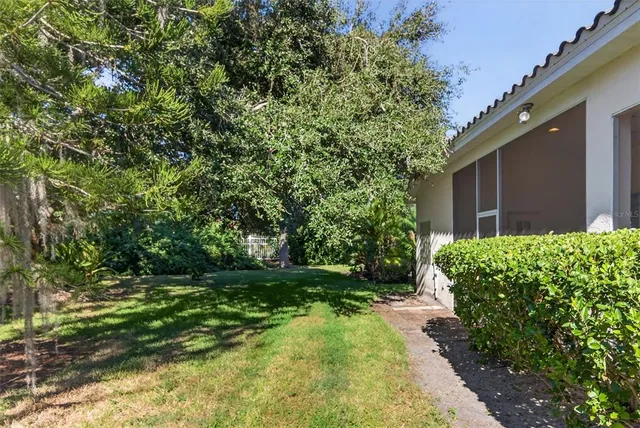 a dining room with furniture window and outside view