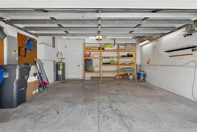 an aerial view of a house with swimming pool