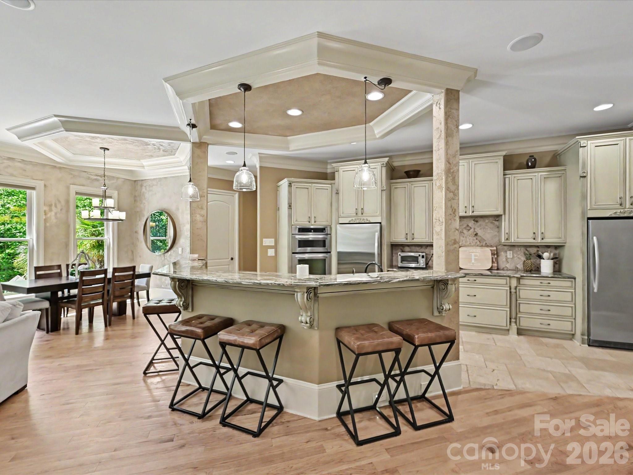 6112 Rehobeth Road Waxhaw, NC 28173 - Photo 11 of 48 a large kitchen with a table and chairs