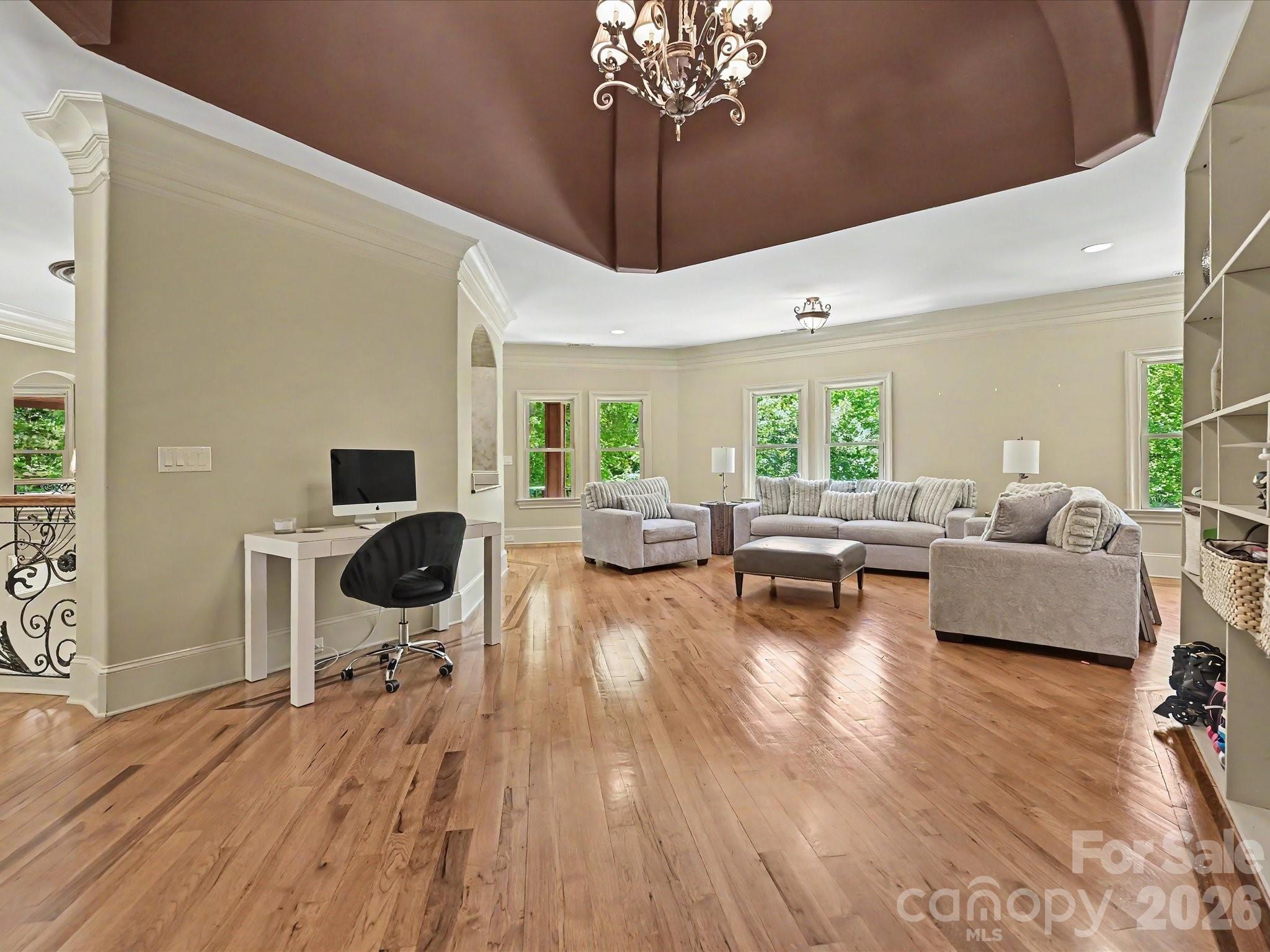 6112 Rehobeth Road Waxhaw, NC 28173 - Photo 22 of 48 a living room with furniture and a flat screen tv