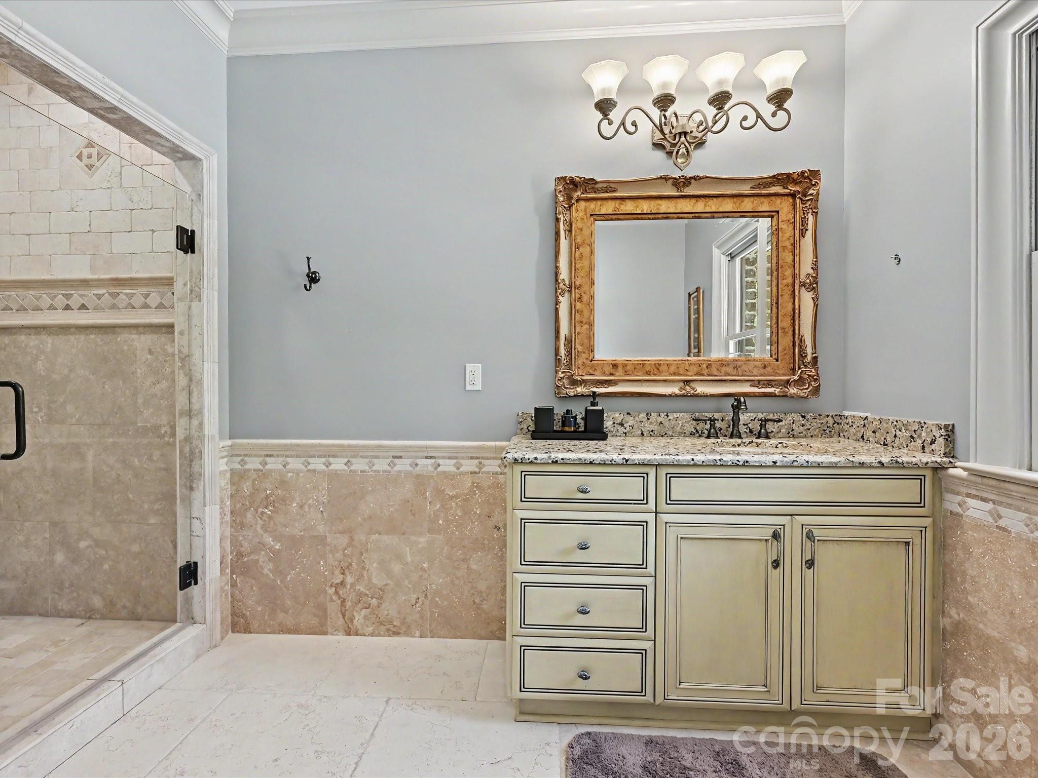 6112 Rehobeth Road Waxhaw, NC 28173 - Photo 24 of 48 a bathroom with a sink vanity and a mirror