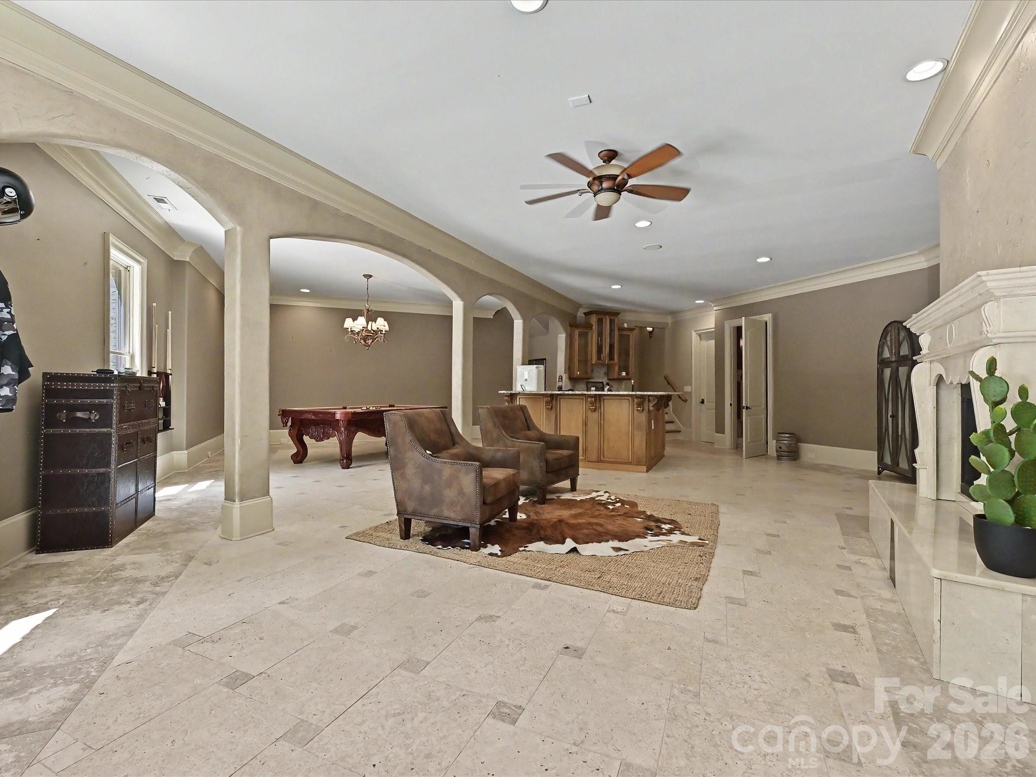 6112 Rehobeth Road Waxhaw, NC 28173 - Photo 30 of 48 a living room with furniture a table and chairs