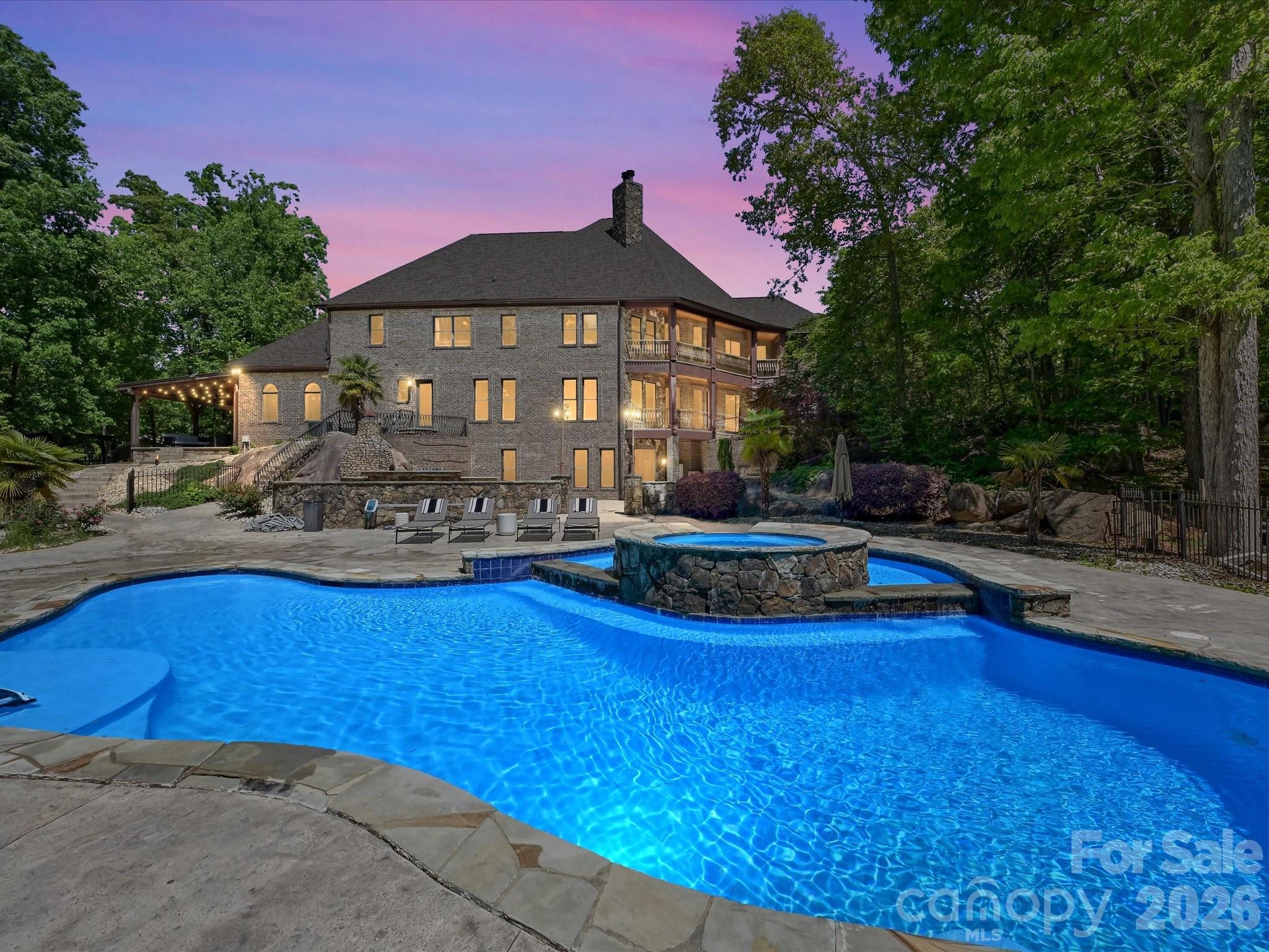 6112 Rehobeth Road Waxhaw, NC 28173 - Photo 4 of 48 a view of a house with swimming pool and sitting area