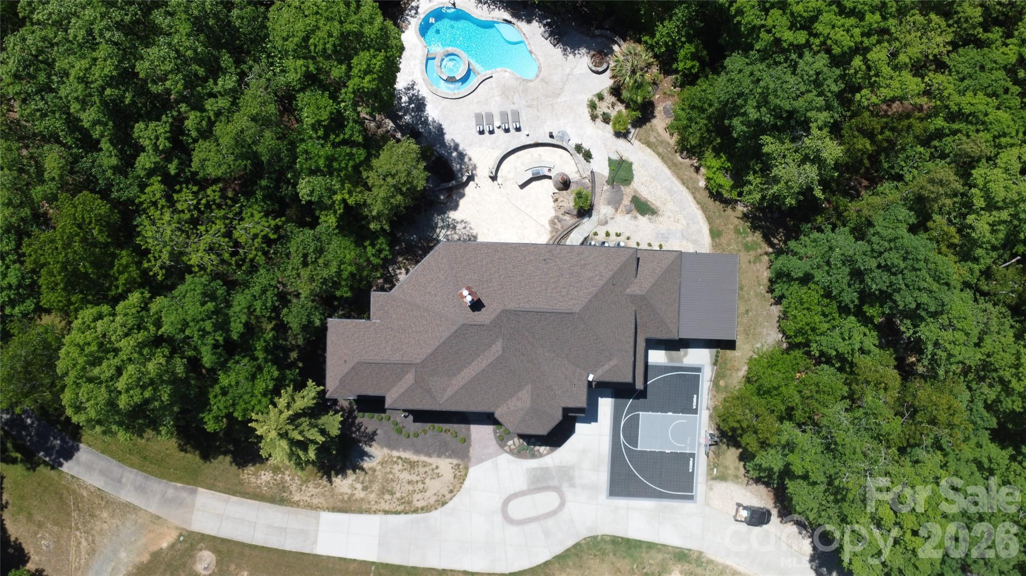 6112 Rehobeth Road Waxhaw, NC 28173 - Photo 48 of 48 an aerial view of a house with garden space and street view