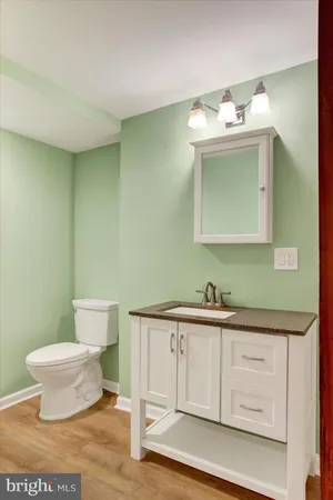 a view of a room with wooden door