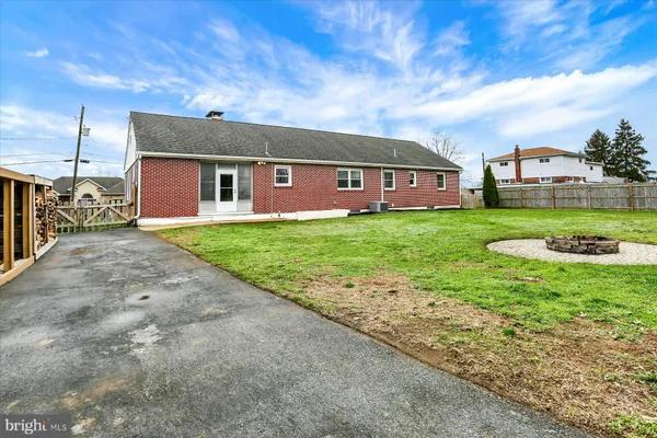 a view of a house with a big yard