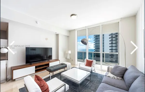 a kitchen with sink refrigerator and stove