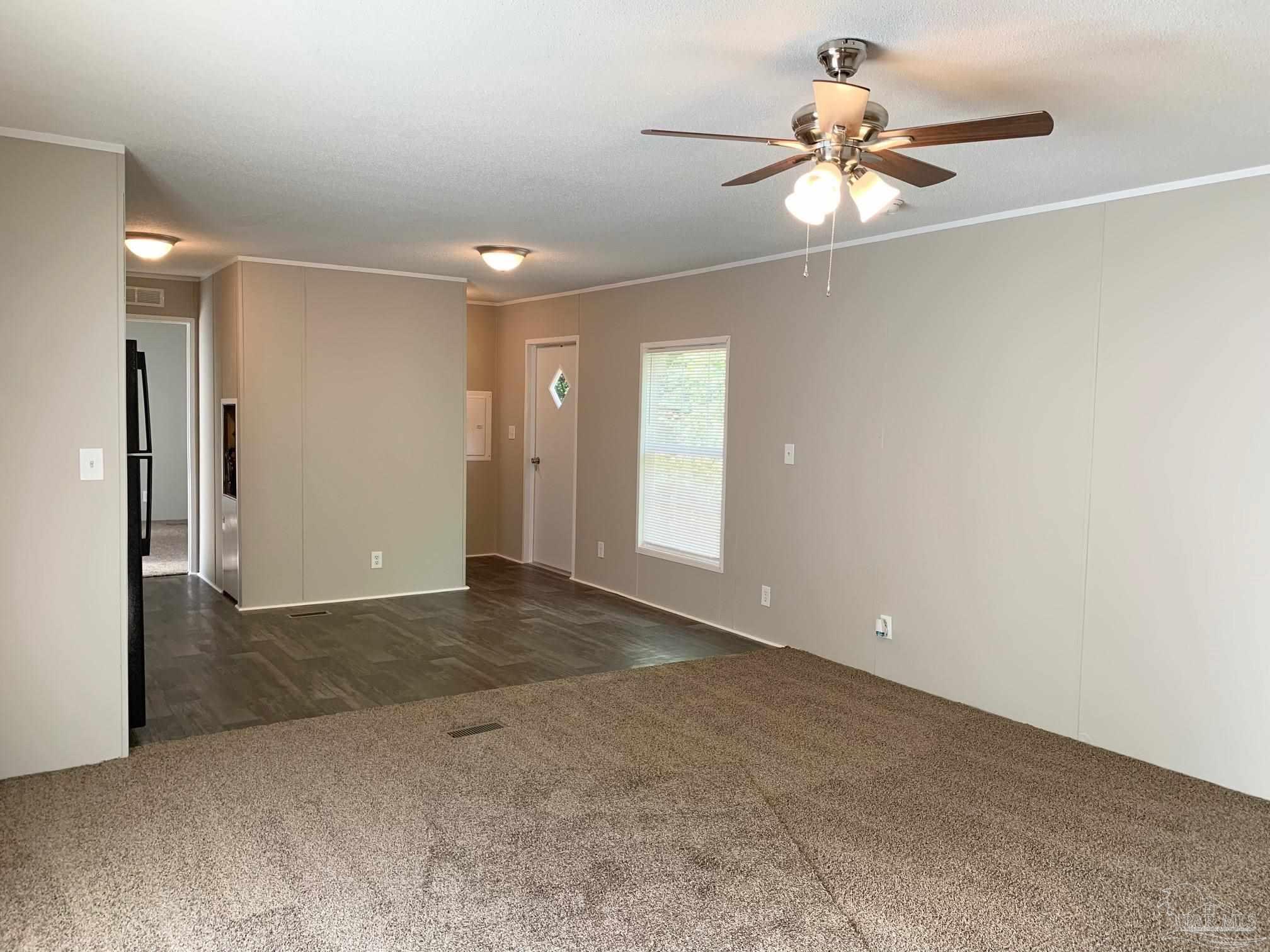 Looking toward Kitchen & Primary Bedroom Suite