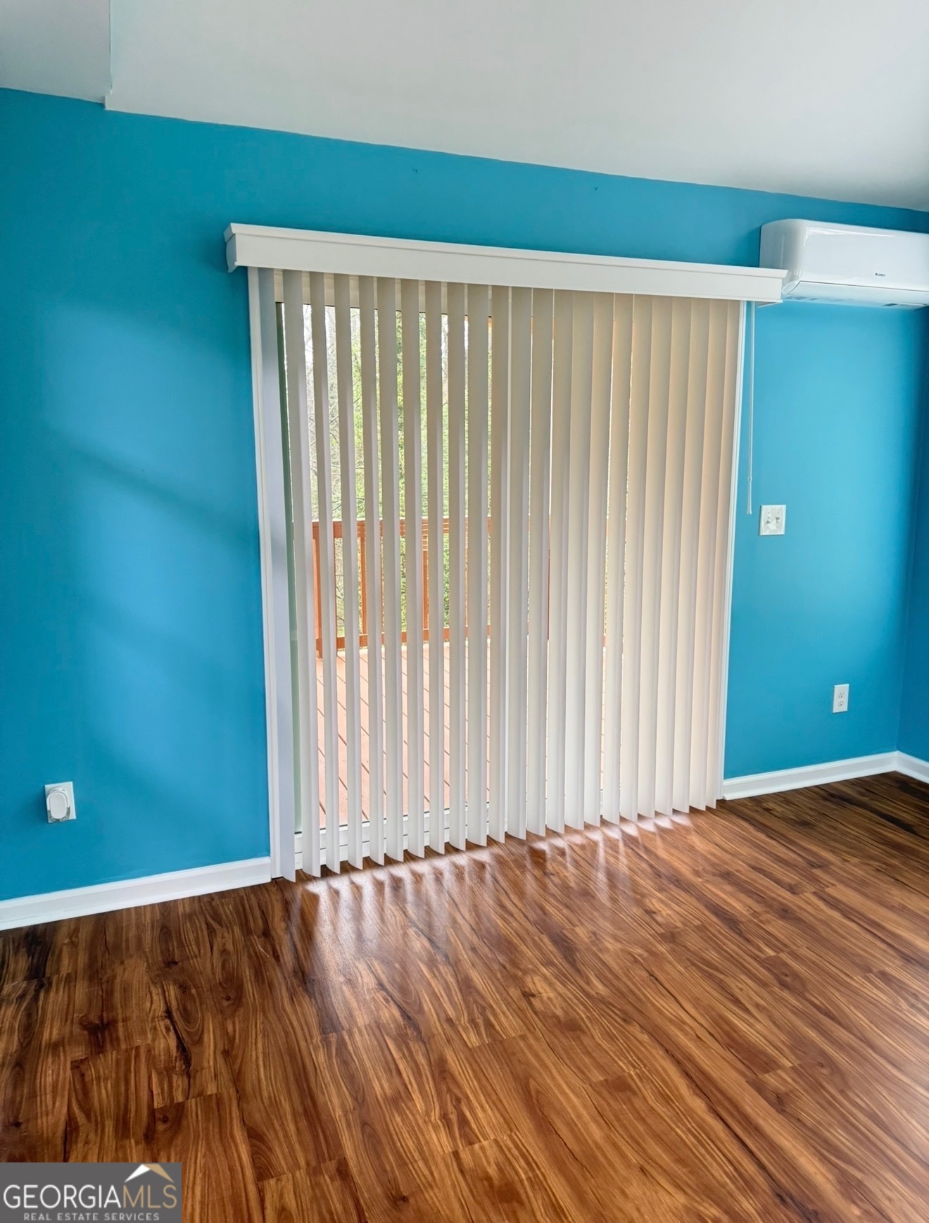 4144 Pinehurst Valley Drive Decatur, GA 30034 - Photo 12 of 31 a view of a room with wooden floor and a window
