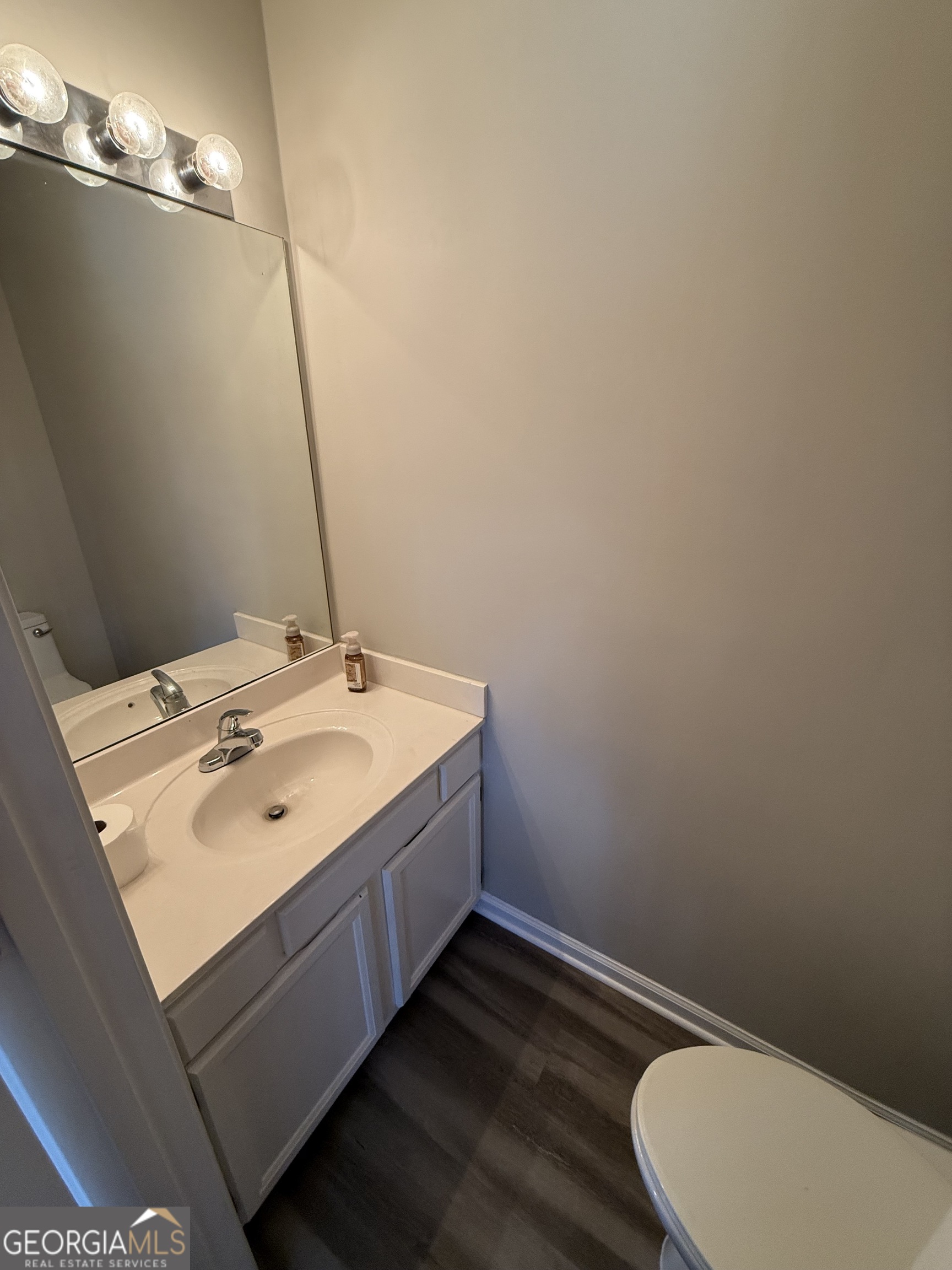4144 Pinehurst Valley Drive Decatur, GA 30034 - Photo 17 of 31 a bathroom with a sink and a toilet