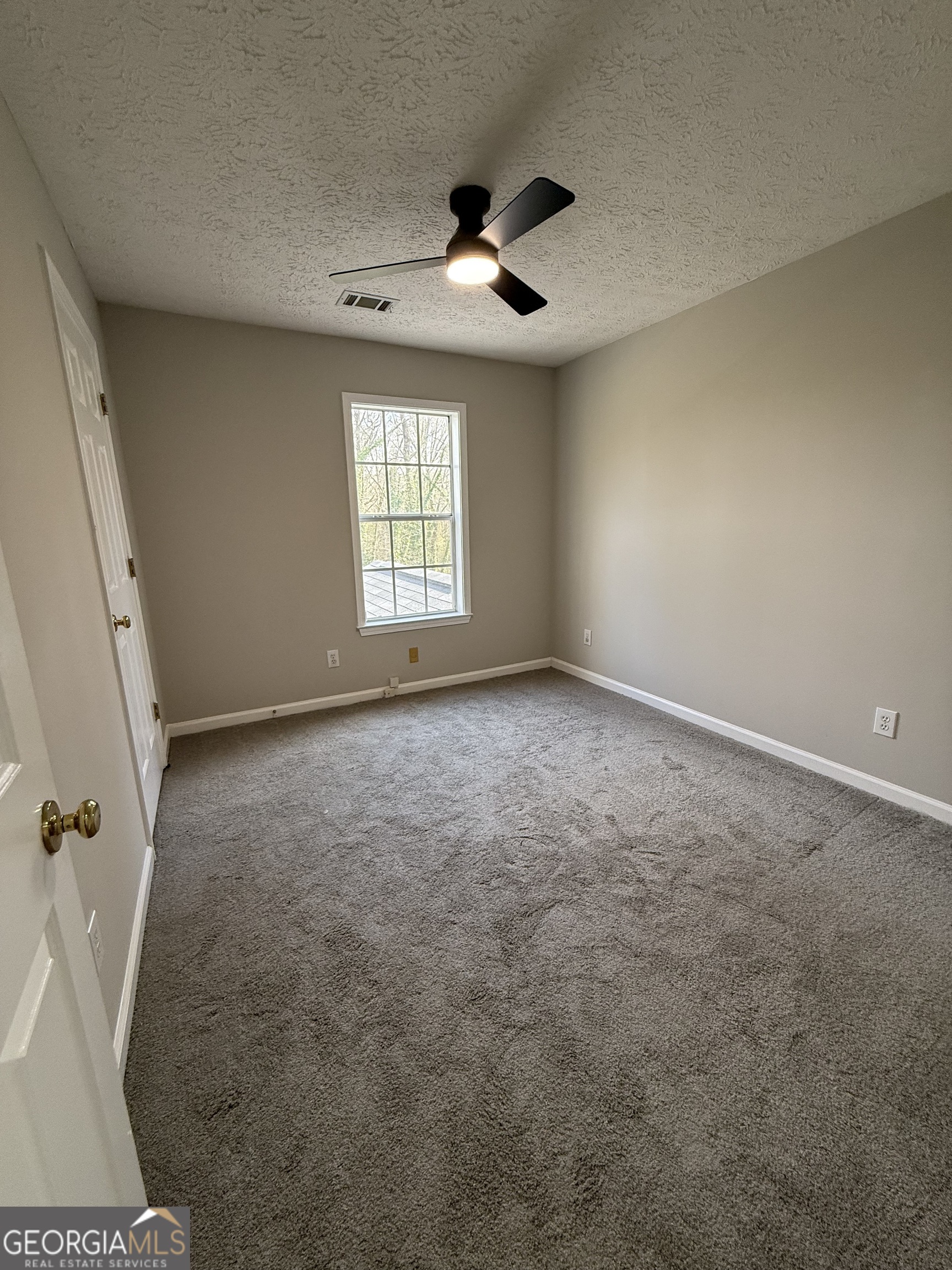 4144 Pinehurst Valley Drive Decatur, GA 30034 - Photo 22 of 31 a view of an empty room with a window