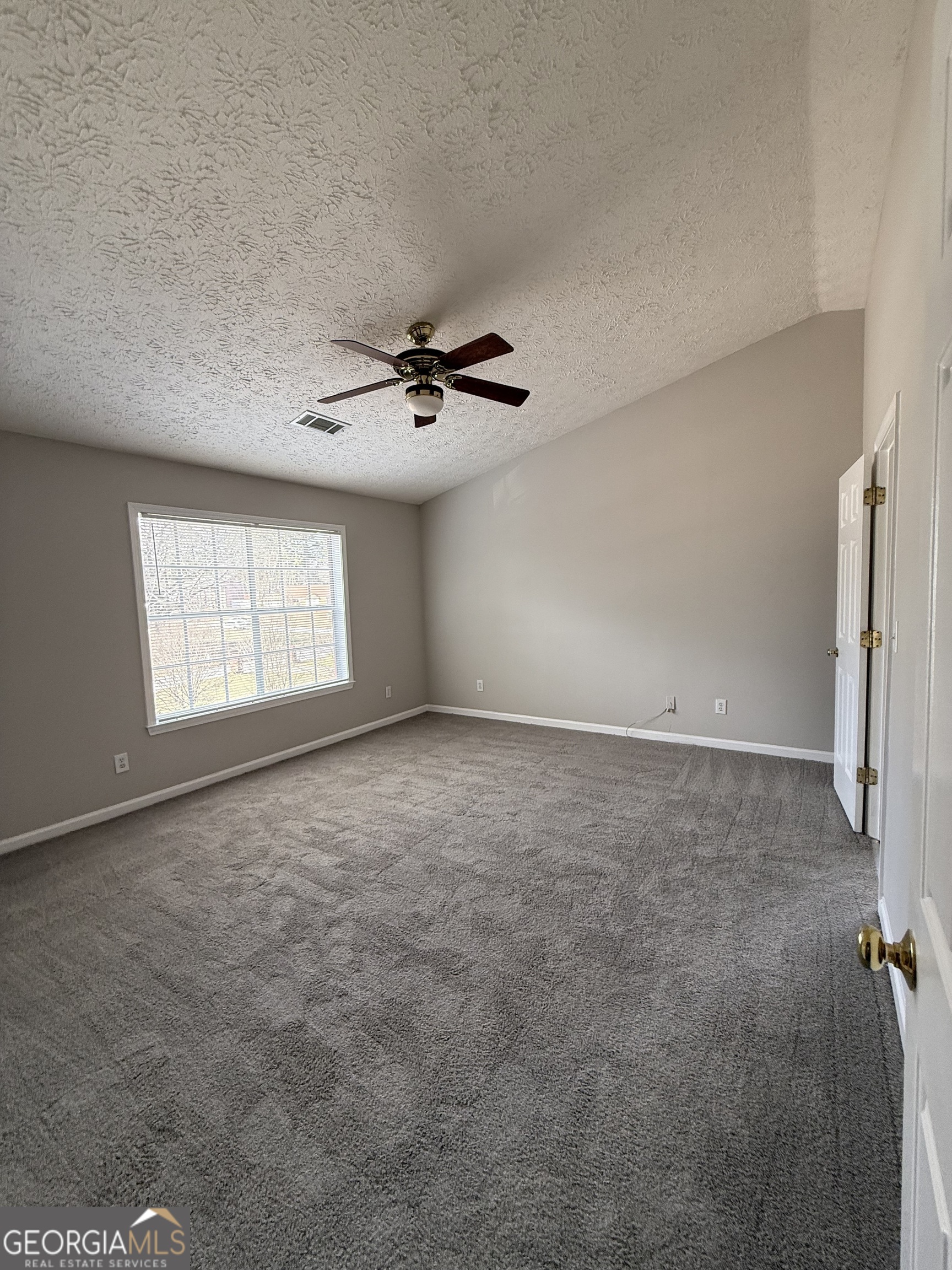 4144 Pinehurst Valley Drive Decatur, GA 30034 - Photo 23 of 31 a view of an empty room with a window