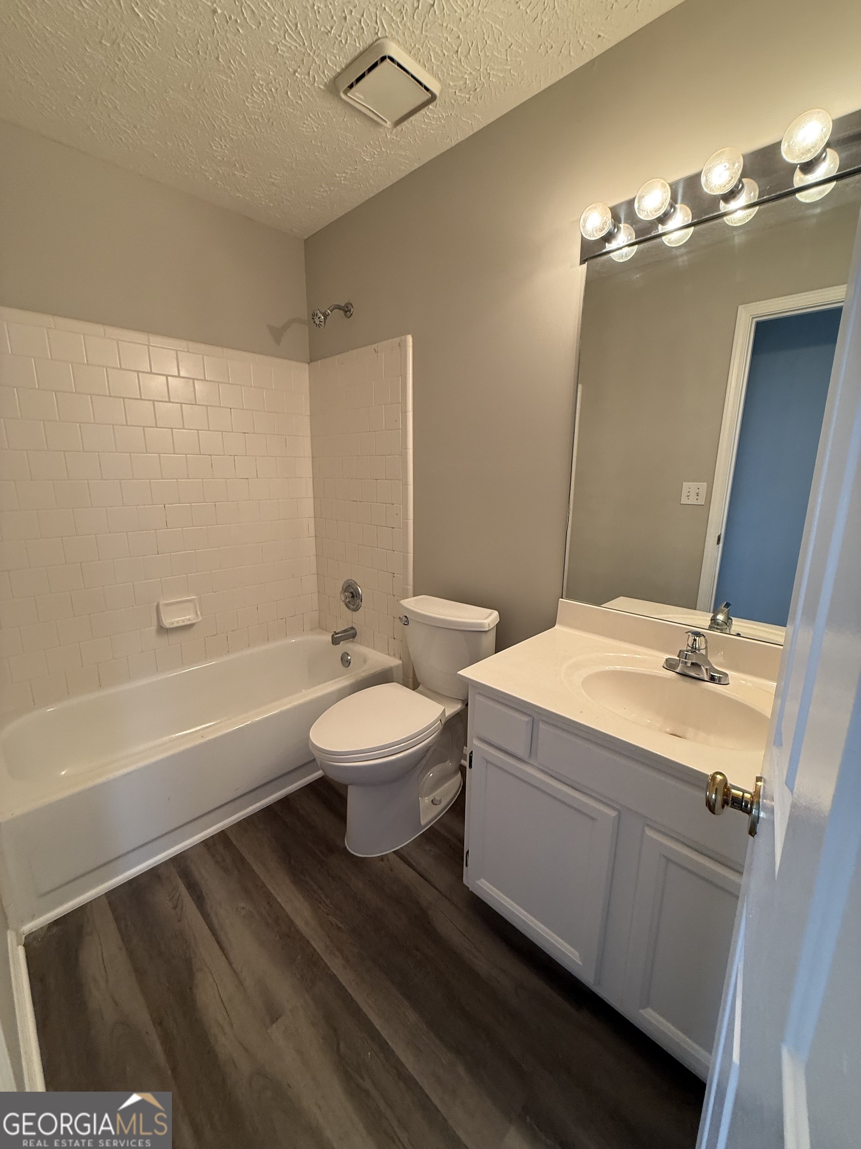 4144 Pinehurst Valley Drive Decatur, GA 30034 - Photo 29 of 31 a bathroom with a sink a toilet and shower