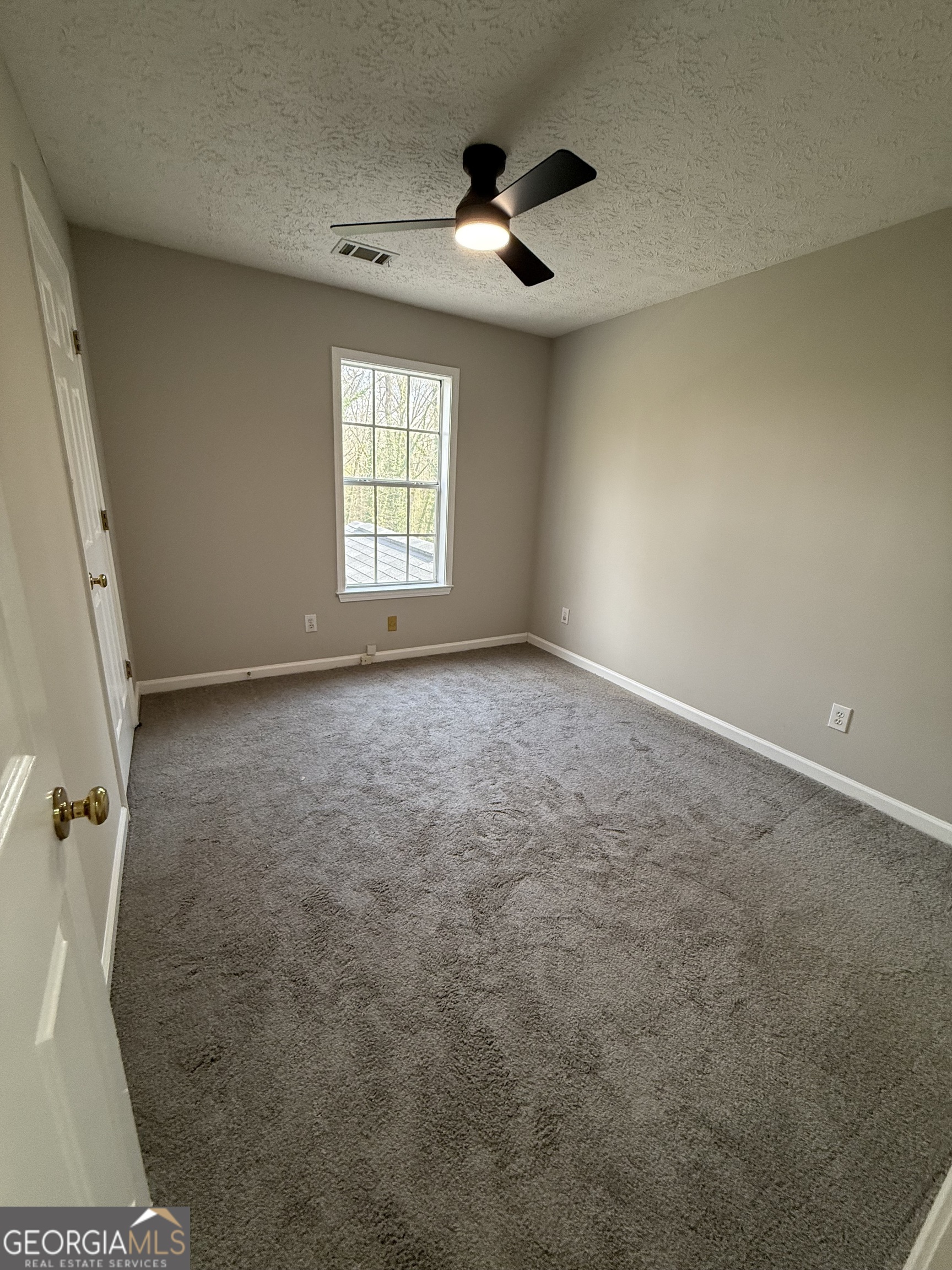 4144 Pinehurst Valley Drive Decatur, GA 30034 - Photo 30 of 31 a view of an empty room with a window