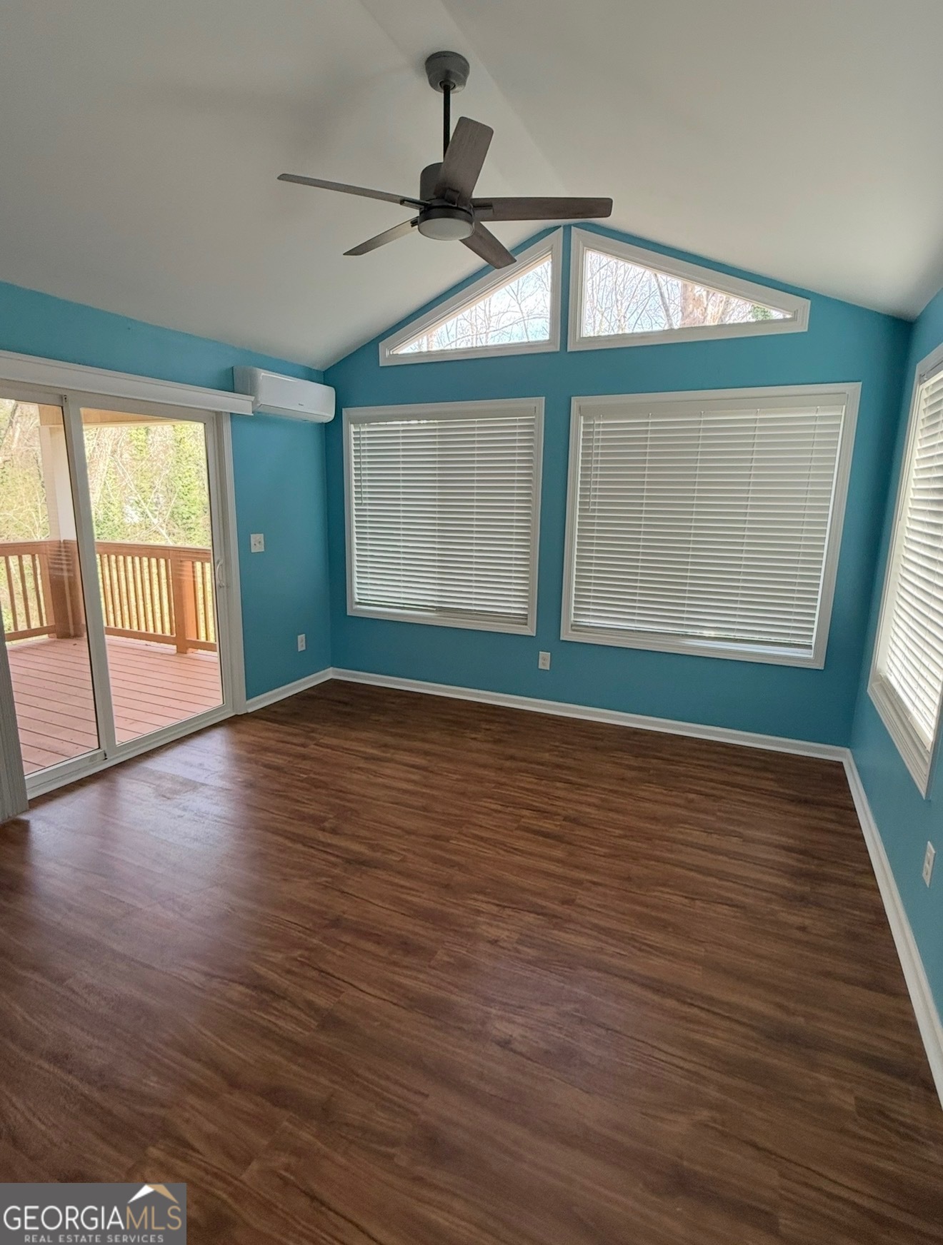 4144 Pinehurst Valley Drive Decatur, GA 30034 - Photo 10 of 31 a view of an empty room with wooden floor and a window