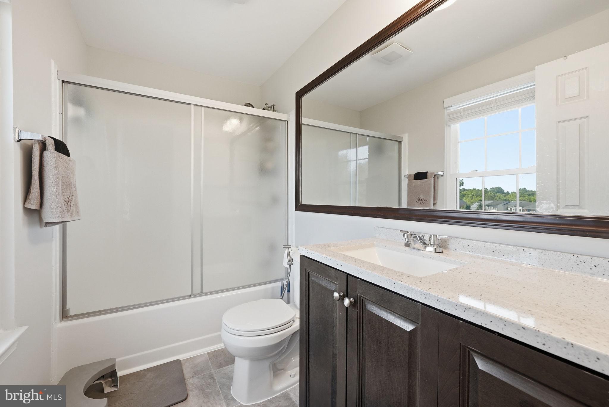 9236 Labelle Lane Gaithersburg, MD 20879 - Photo 21 of 33 Modern bathroom with natural light.