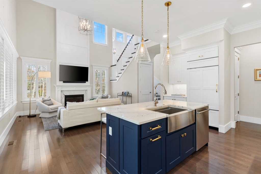 19 Gershon Way, Unit 1 Winchester, MA 01890 - Photo 14 of 42 a kitchen with a sink and a stove top oven