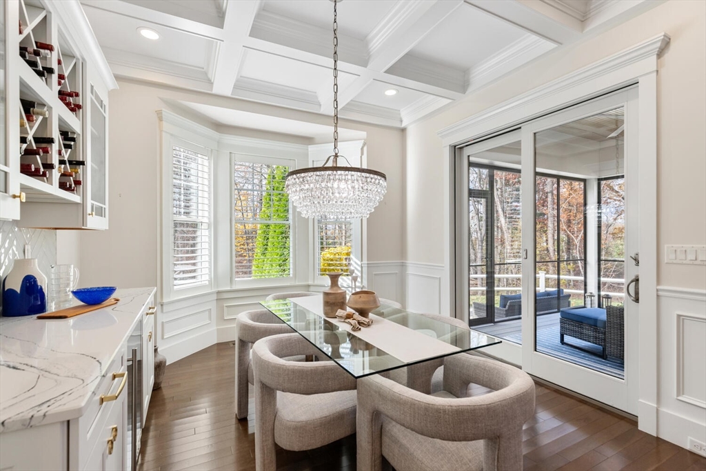 19 Gershon Way, Unit 1 Winchester, MA 01890 - Photo 17 of 42 a living room with furniture and a large window