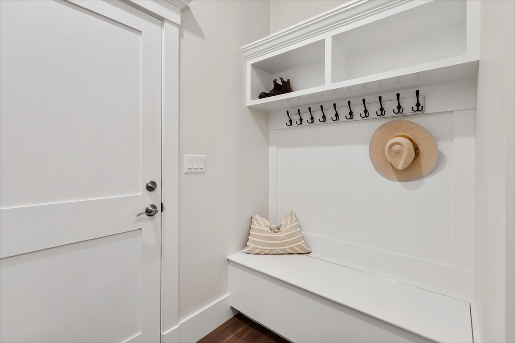 19 Gershon Way, Unit 1 Winchester, MA 01890 - Photo 26 of 42 a close view of utility room with washer and dryer