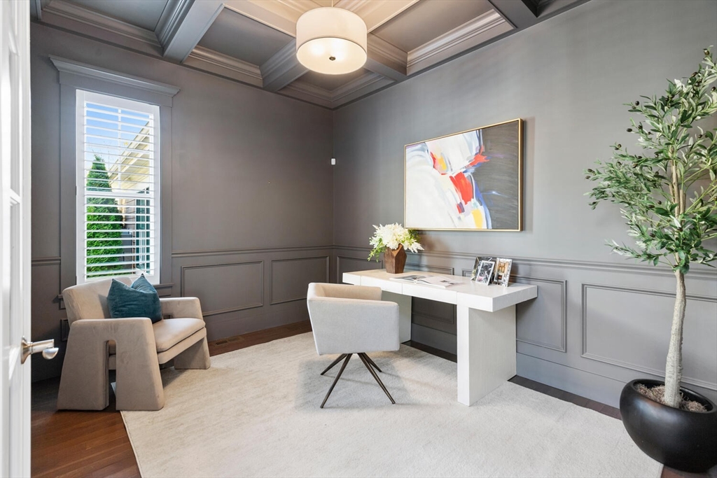 19 Gershon Way, Unit 1 Winchester, MA 01890 - Photo 7 of 42 a work room with furniture and potted plants