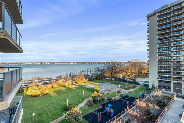 a view of a lake with a big yard