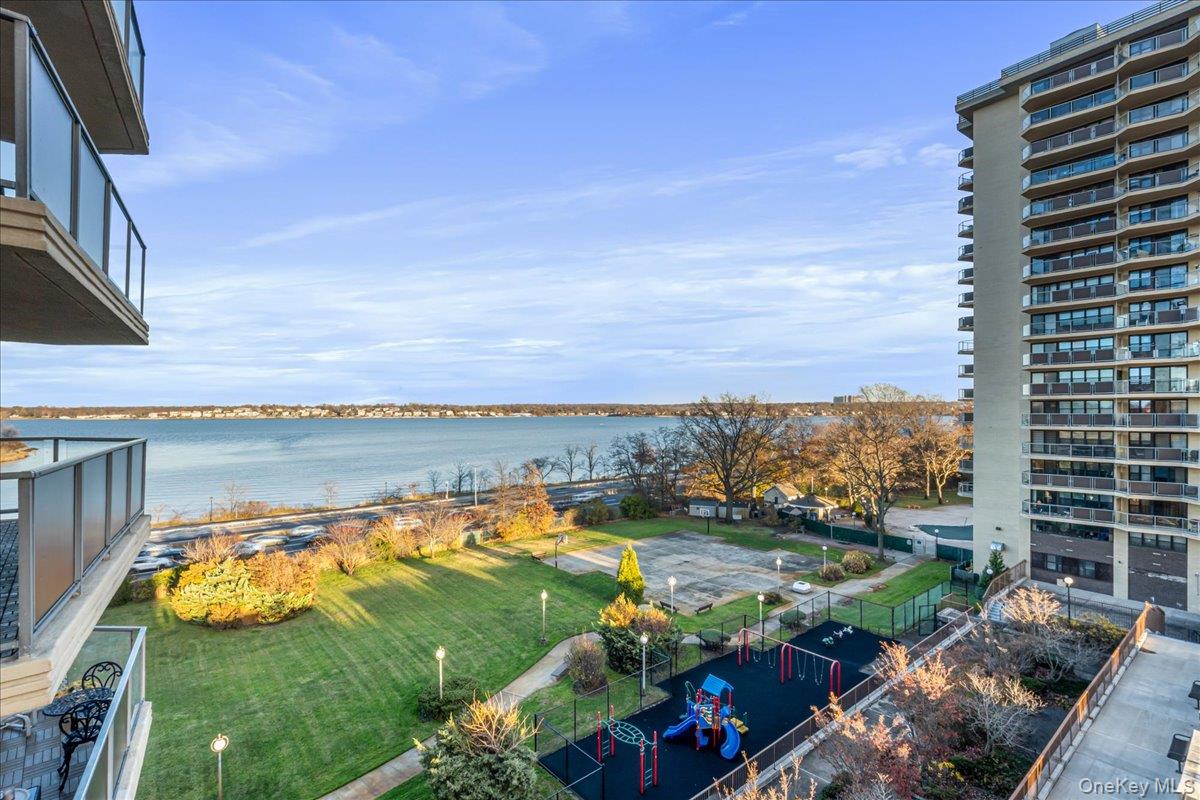 17-85 215th Street, Unit 5L Queens, NY 11360 - Photo 2 of 46 a view of a lake with a big yard