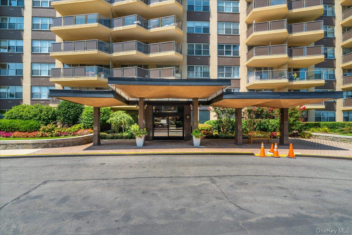 17-85 215th Street, Unit 5L Queens, NY 11360 - Photo 26 of 46 front view of a building with a street