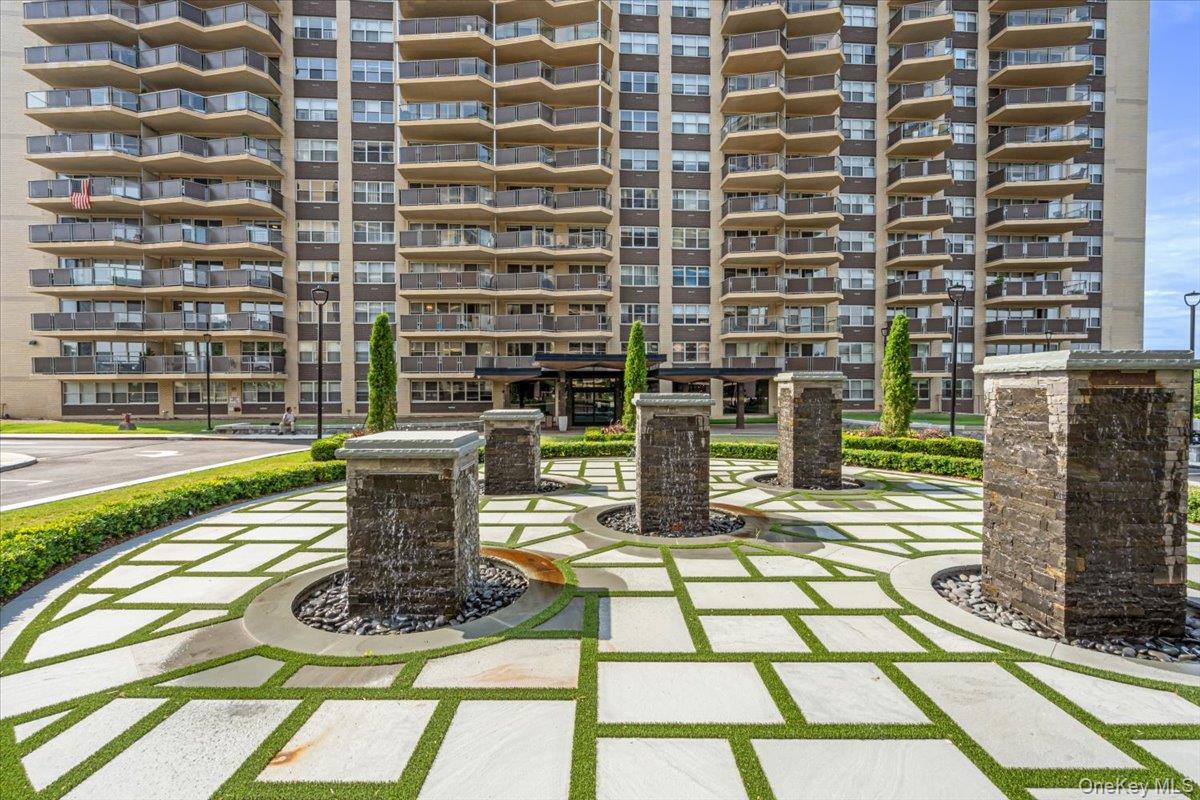 17-85 215th Street, Unit 5L Queens, NY 11360 - Photo 29 of 46 a view of swimming pool with outdoor seating