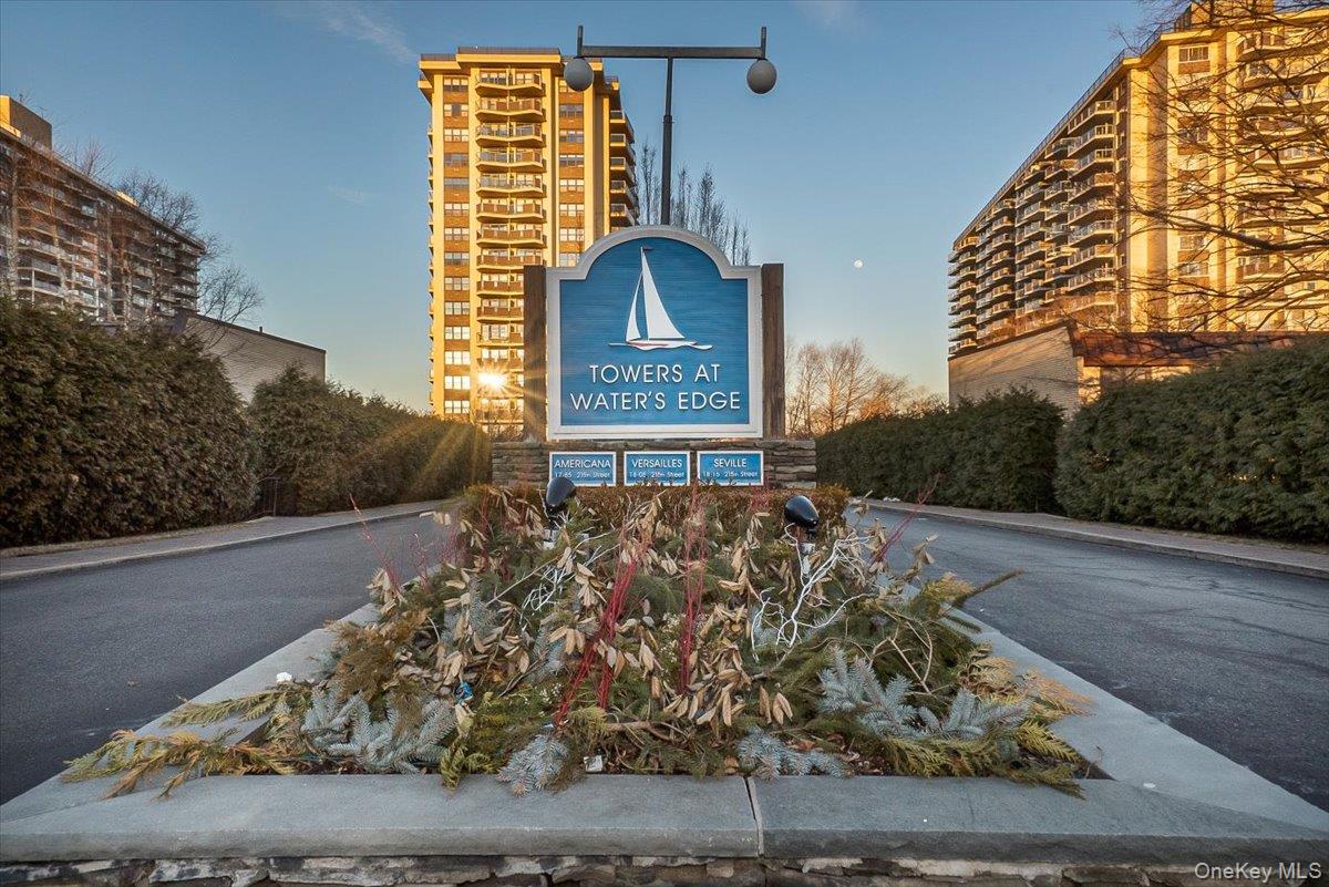 17-85 215th Street, Unit 5L Queens, NY 11360 - Photo 38 of 46 a sign that is on the side of a road