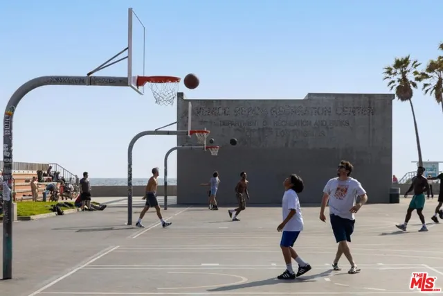a view of entryway wih livingroom and stairs