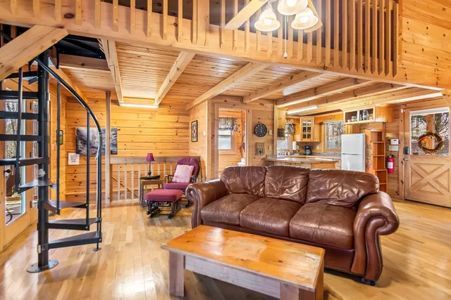 a view of a livingroom with furniture and a couch