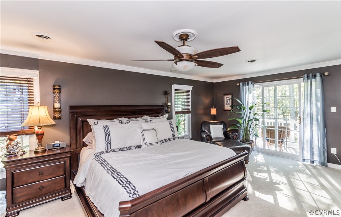 3216 Fortunes Ridge Road Midlothian, VA 23112 - Photo 23 of 41 a bedroom with a bed and a large window with the outer view