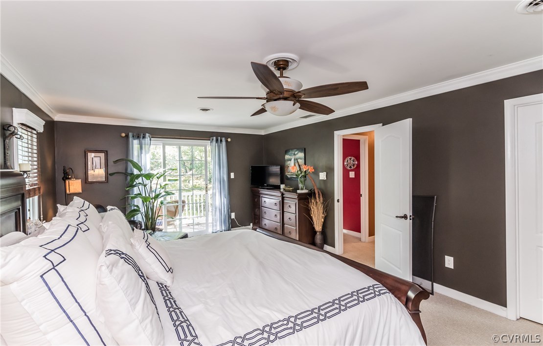 3216 Fortunes Ridge Road Midlothian, VA 23112 - Photo 24 of 41 a bed room with a bed and a large mirror